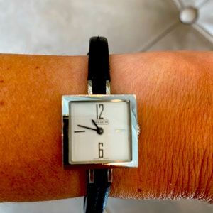 Coach black leather, square-faced delicate ladies watch.